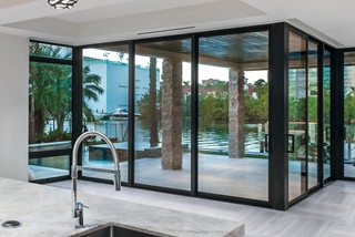 Interior of home with Marvin Signature Coastline Multi-Slide Door and Direct Glaze Narrow Frame Window and Awning Window